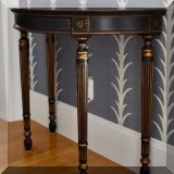 F01. Bombay Company black painted demilune table. 32”h x 35”w x 18”d 